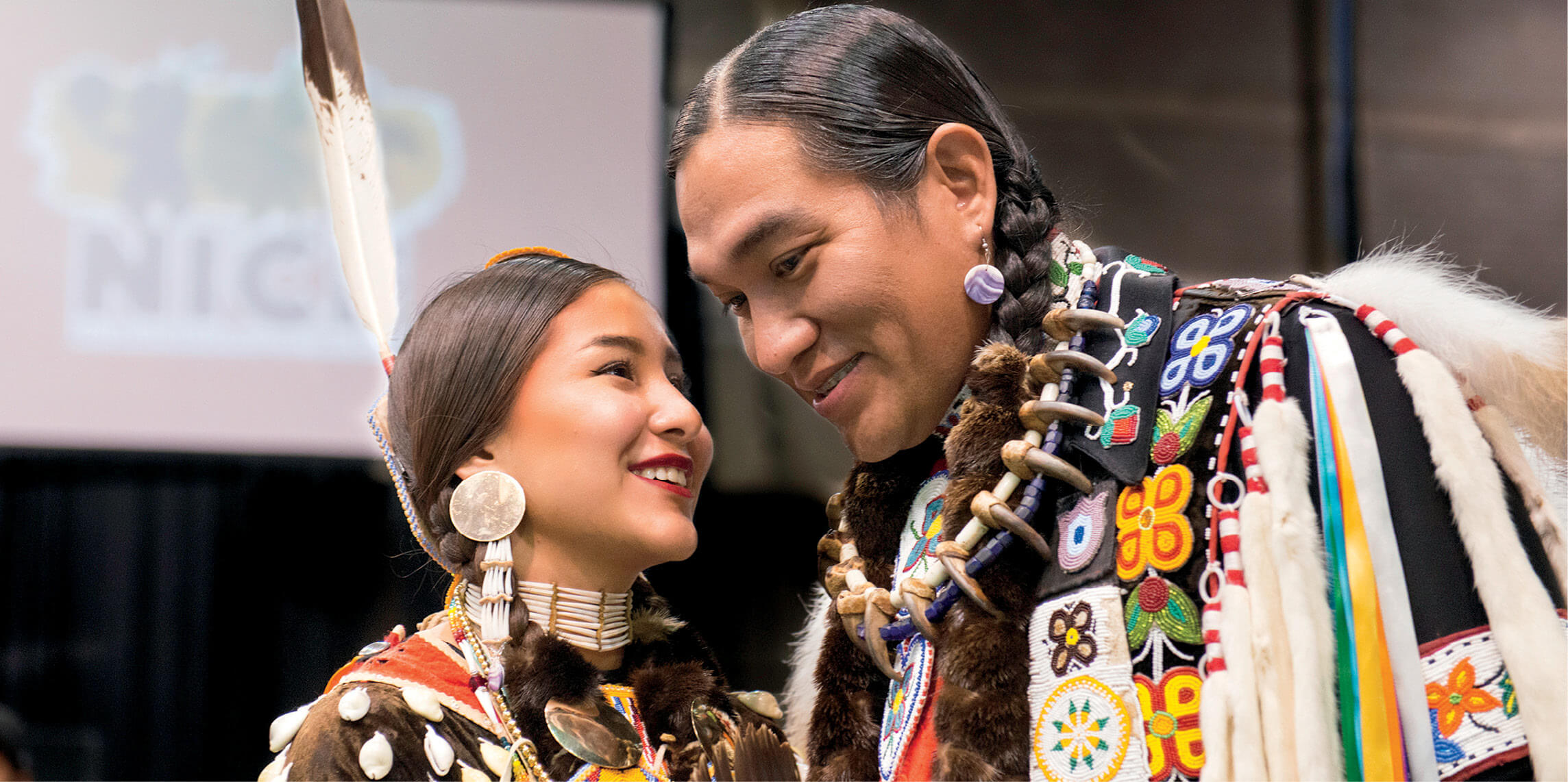 Grass dancer Adam Nordwall Chippewa and his daughter Traditional dancer - photo 1