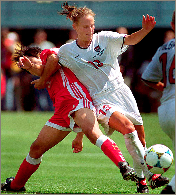 Kristine Lilly battled for the ball She would be one of the five shootout - photo 4