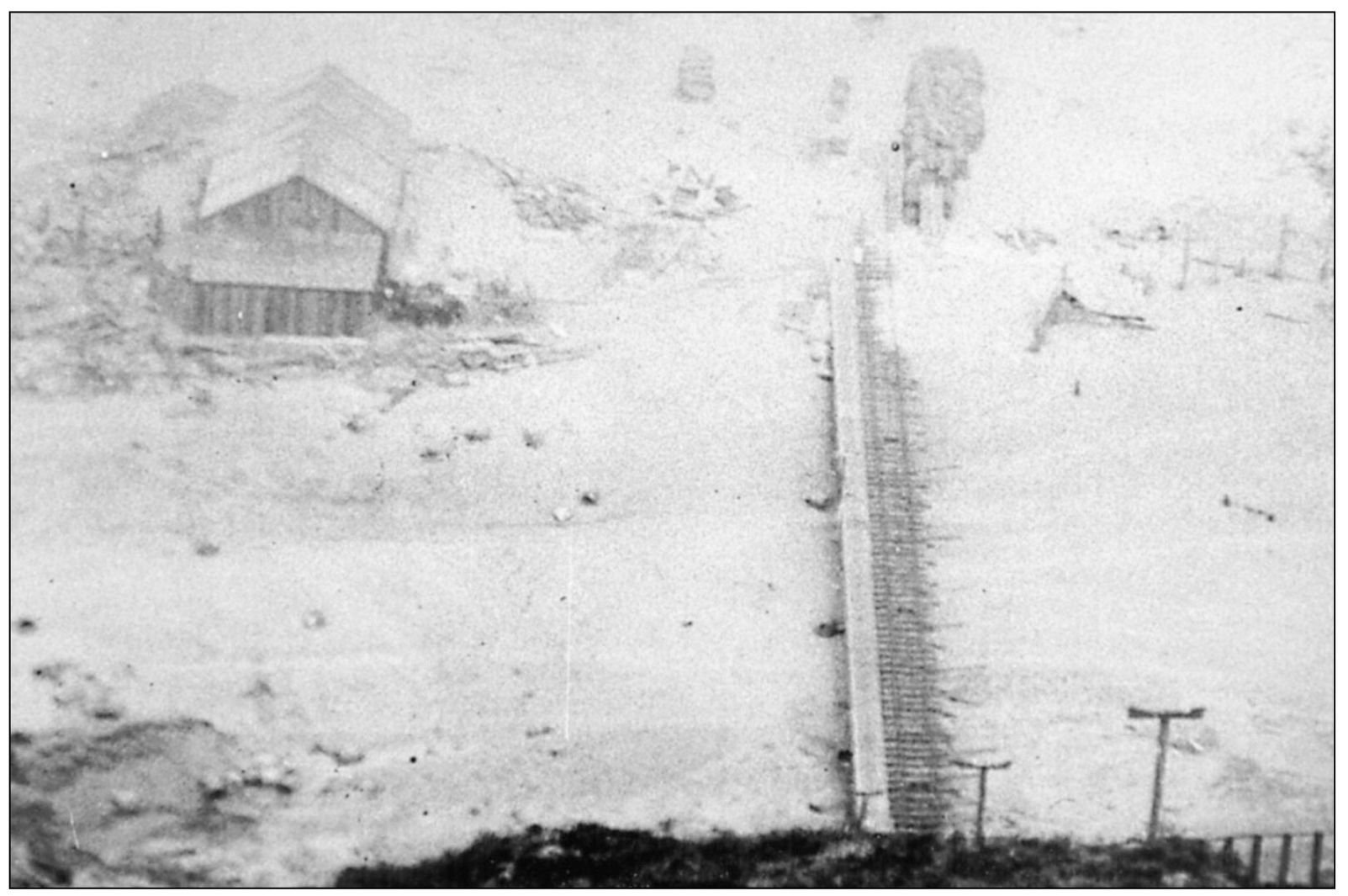 The barn is visible in this detail of an 1889 photograph looking down the - photo 12