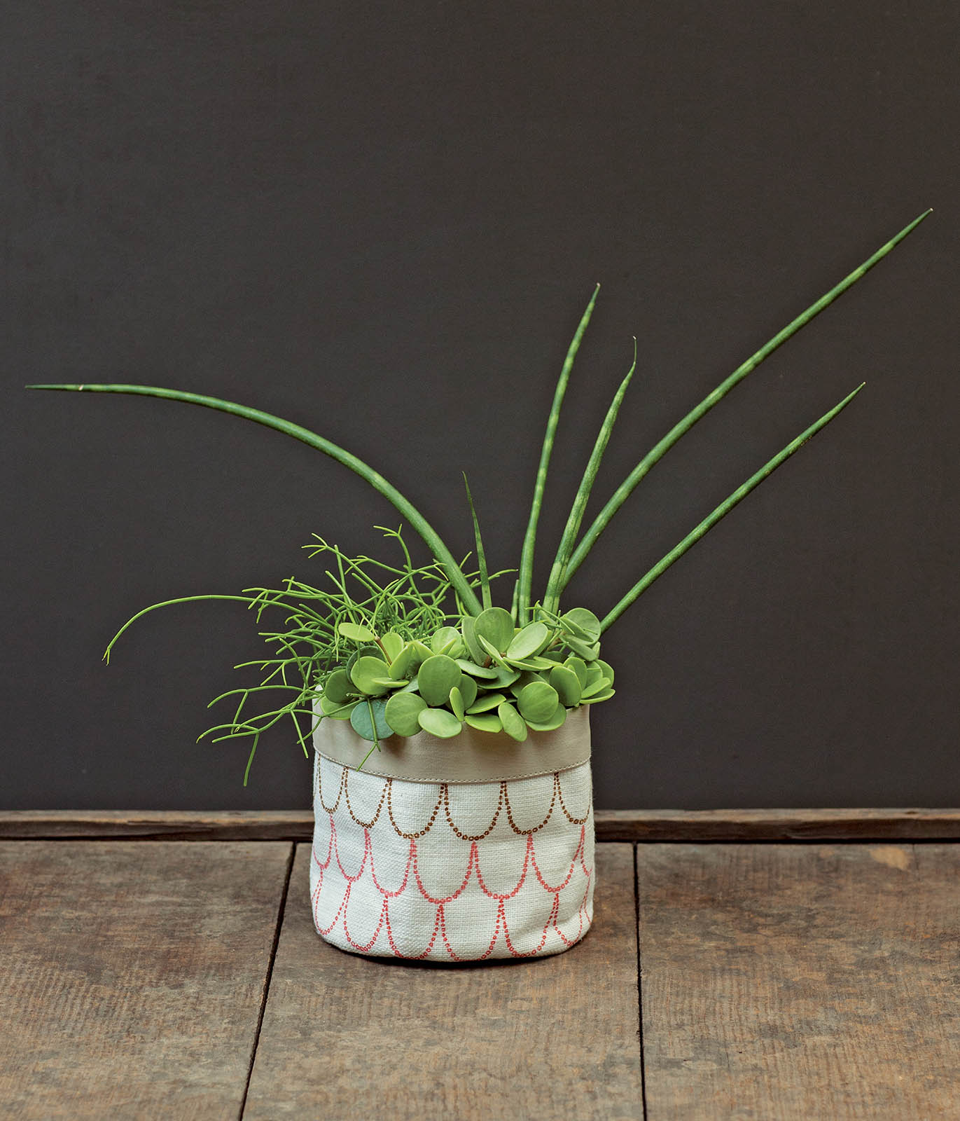 A patterned basket or pot can be a fun alternative to a traditional vase Here - photo 8