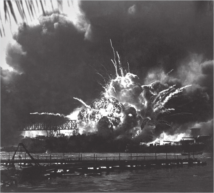 The USS Shaw exploded after it was bombed by Japanese pilots during the attack - photo 2