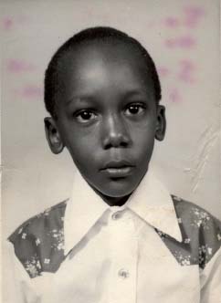 Me as a five-year-old in Nairobi Dad relaxing in the garden in Bulawayo - photo 1