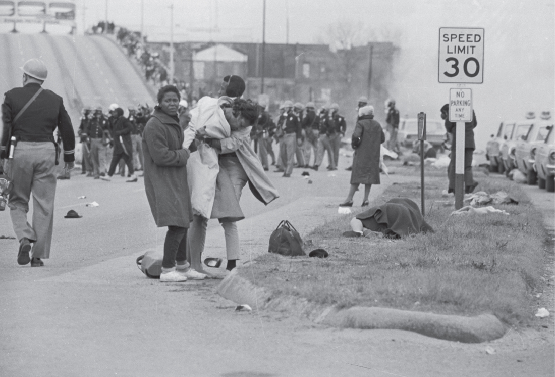 TV viewers saw scenes such as this onetwo marchers holding up another brutally - photo 3