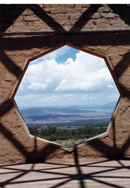 Window of main building under construction Lama Foundation Lama New Mexico - photo 7