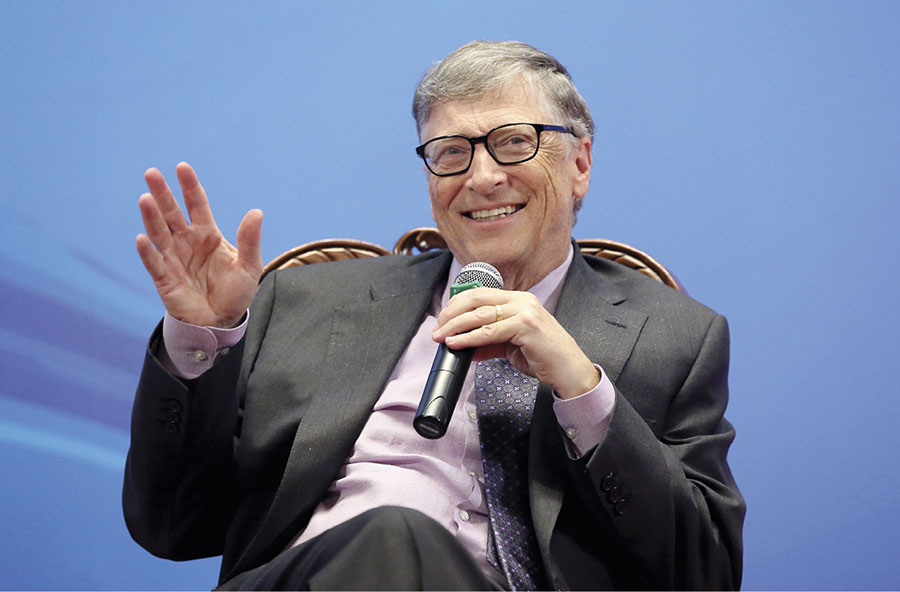 Bill Gates founder of Microsoft speaks at a conference in China in 2017 One - photo 4