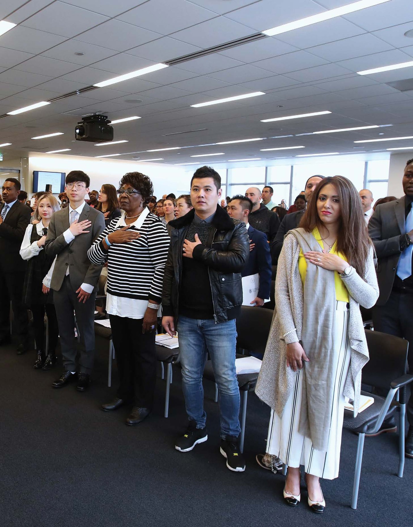 People take an oath or make a promise when they become naturalized citizens - photo 7