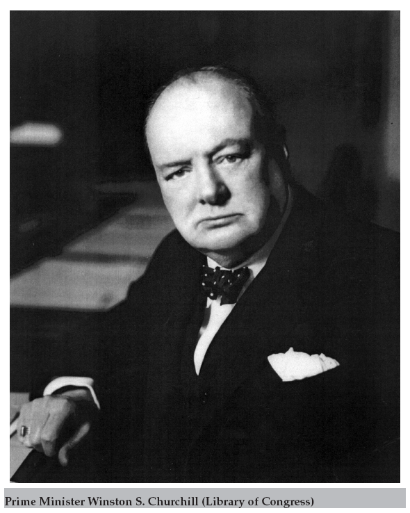 Prime Minister Winston Churchill behind his desk in the British War Office at - photo 10