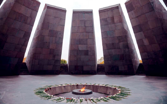 The Armenian Genocide memorial in Yerevan features an eternal flame surrounded - photo 6