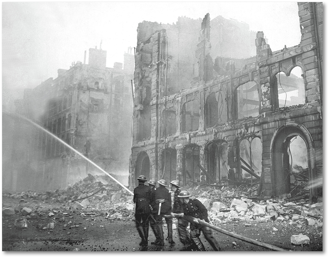 Firefighters put out flames from German bombs during the Battle of Britain I - photo 5