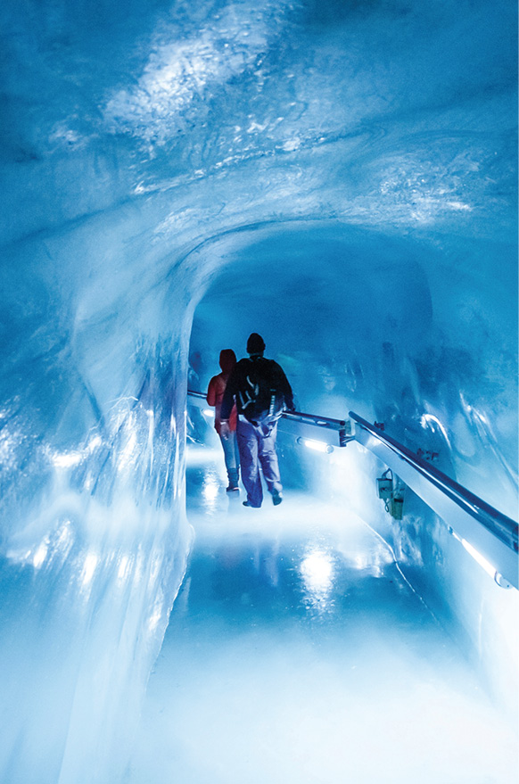 At Jungfraujochs famed Eispalast Ice Palace visitors walk inside artfully - photo 16