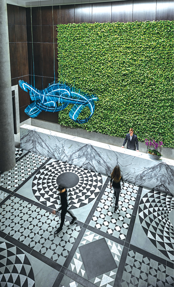 The living garden lobby of Hotel X features a towering wall of green See - photo 18