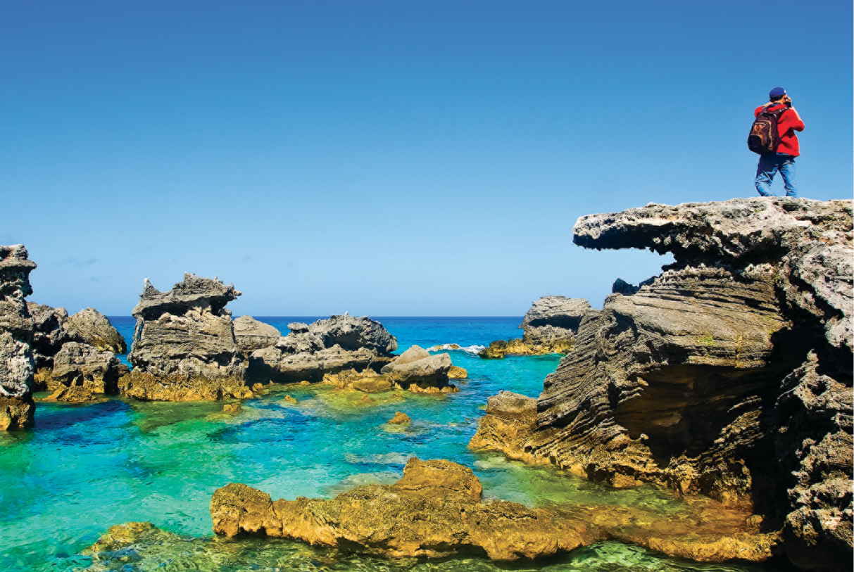 A vacationer climbs the rock formations in Tobacco Bay Attend a cricket - photo 15