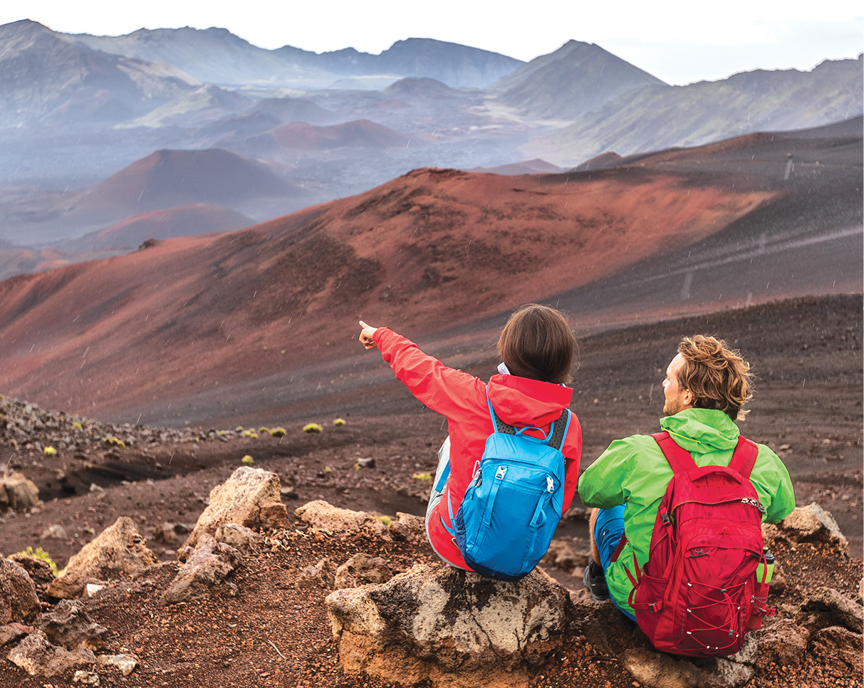 Hikers overlooking the volcanic landscape in Haleakala National Park See - photo 12