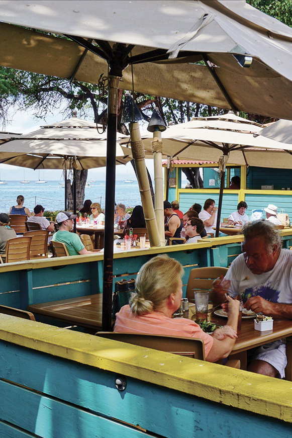 Diners at Aloha Mixed Plate a popular beachside barbecue restaurant in - photo 16