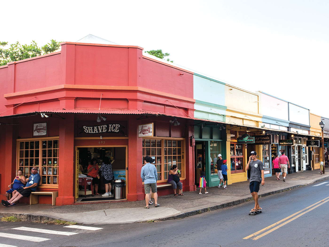 The colorful low-rise streetscape of Lahaina a former missionary town and once - photo 18