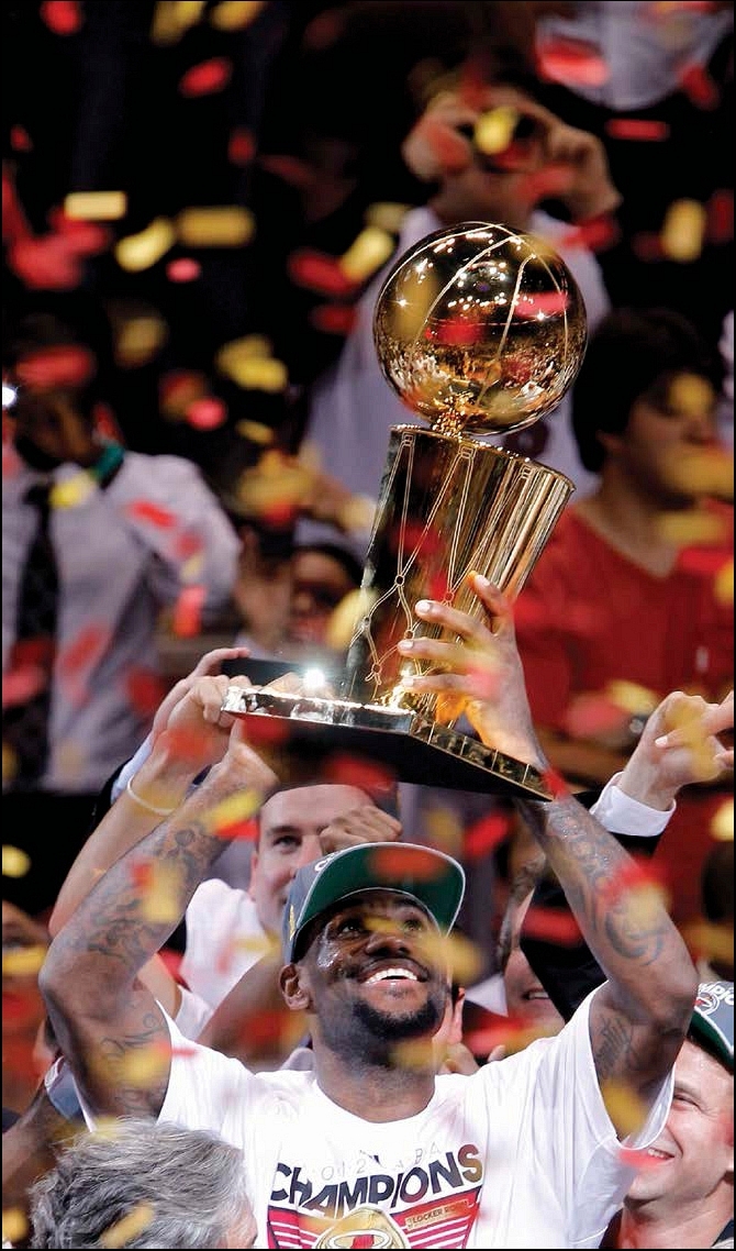 LeBron celebrates his first championship win with the Miami Heat in 2012 - photo 9