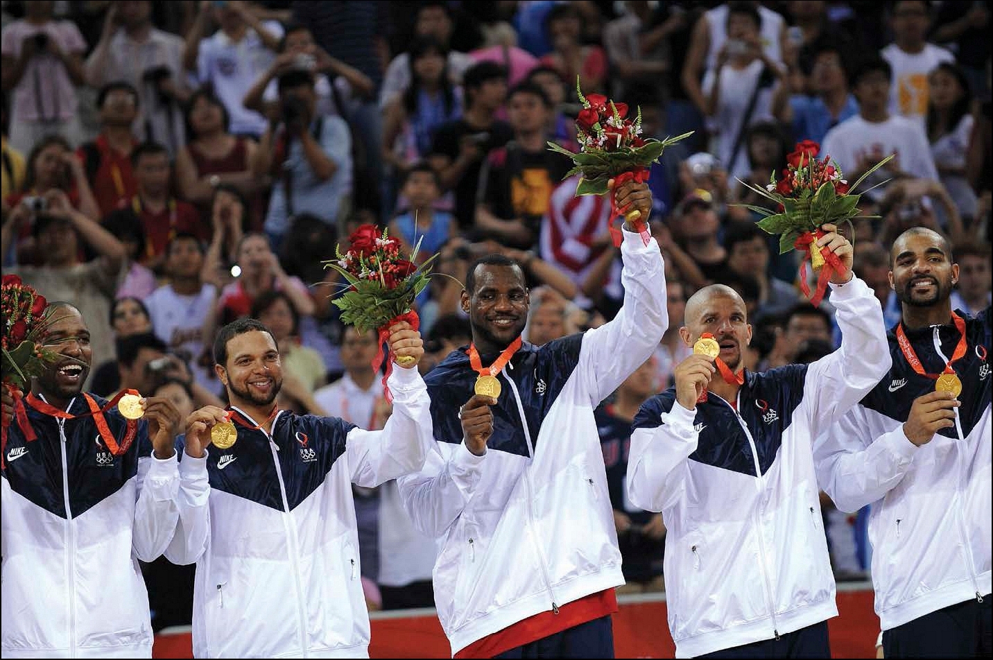 LeBron center and his United States teammates show off their gold medals at - photo 10