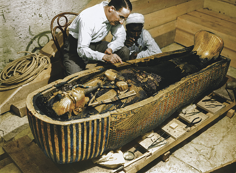 Howard Carter and an Egyptian workman examine King Tuts third and innermost - photo 6