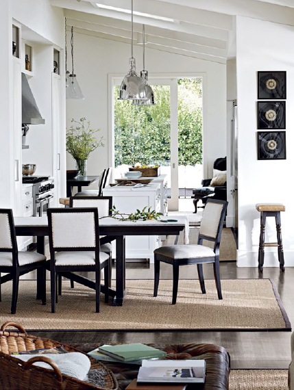 White projects cosmopolitan panache in this combined dining room and kitchen - photo 15