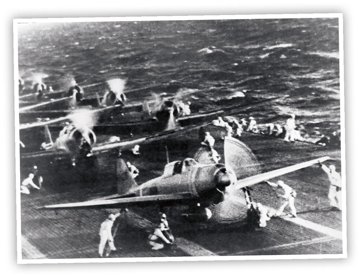 Japanese planes wait to take off from an aircraft carrier the morning of - photo 11