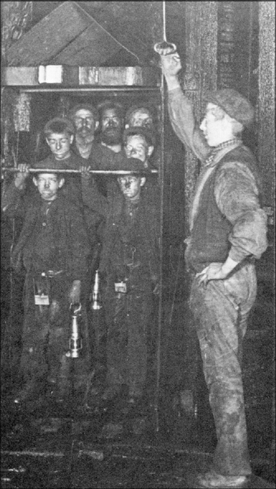 The onsetter signals to the winding engineman for the cage to be raised up the - photo 4