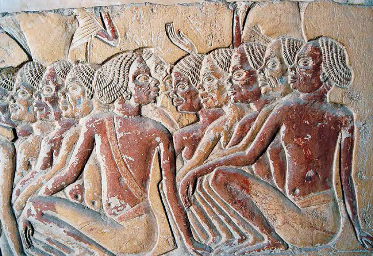 This sculptural relief of Nubian slaves is located in the Tomb of Horemheb in - photo 4