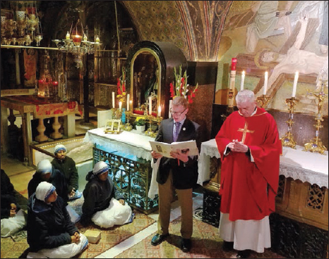 Author lectoring during Mass on Calvary Lent 2018 The Rock of Calvary is - photo 4