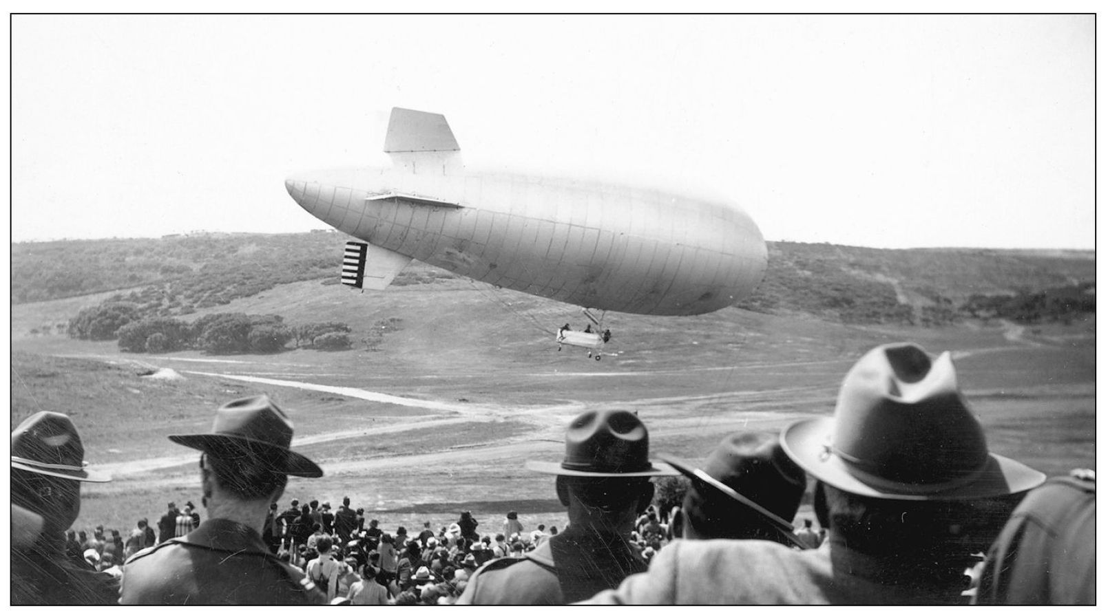 To the amazement of onlooking soldiers an Army blimp flies over the Parker - photo 5