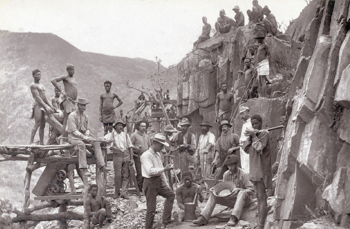 This photograph taken around 1888 shows miners at a South African gold mine - photo 6