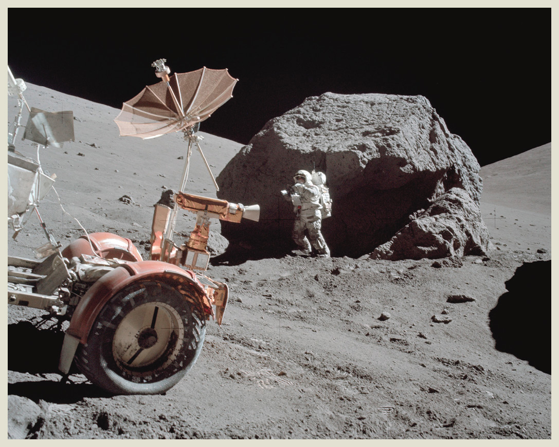 Harrison Jack Schmitt collects rock and soil samples near a huge boulder When - photo 4