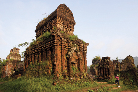 Today tourists visit the ruined temples from the Kingdom of Champa THE TRUNG - photo 4