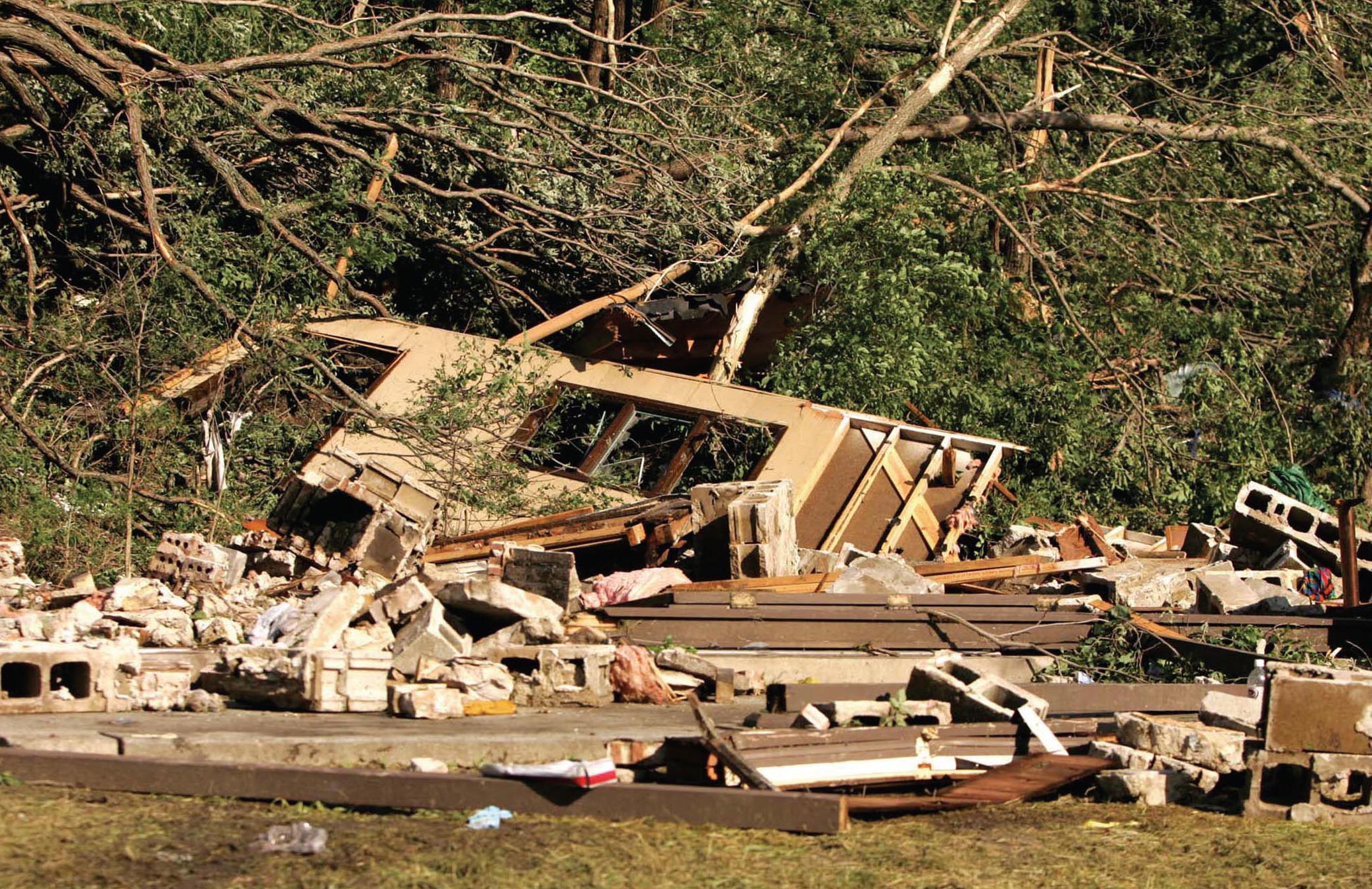 The tornado completely destroyed the north cabin while the Scouts tried to take - photo 7