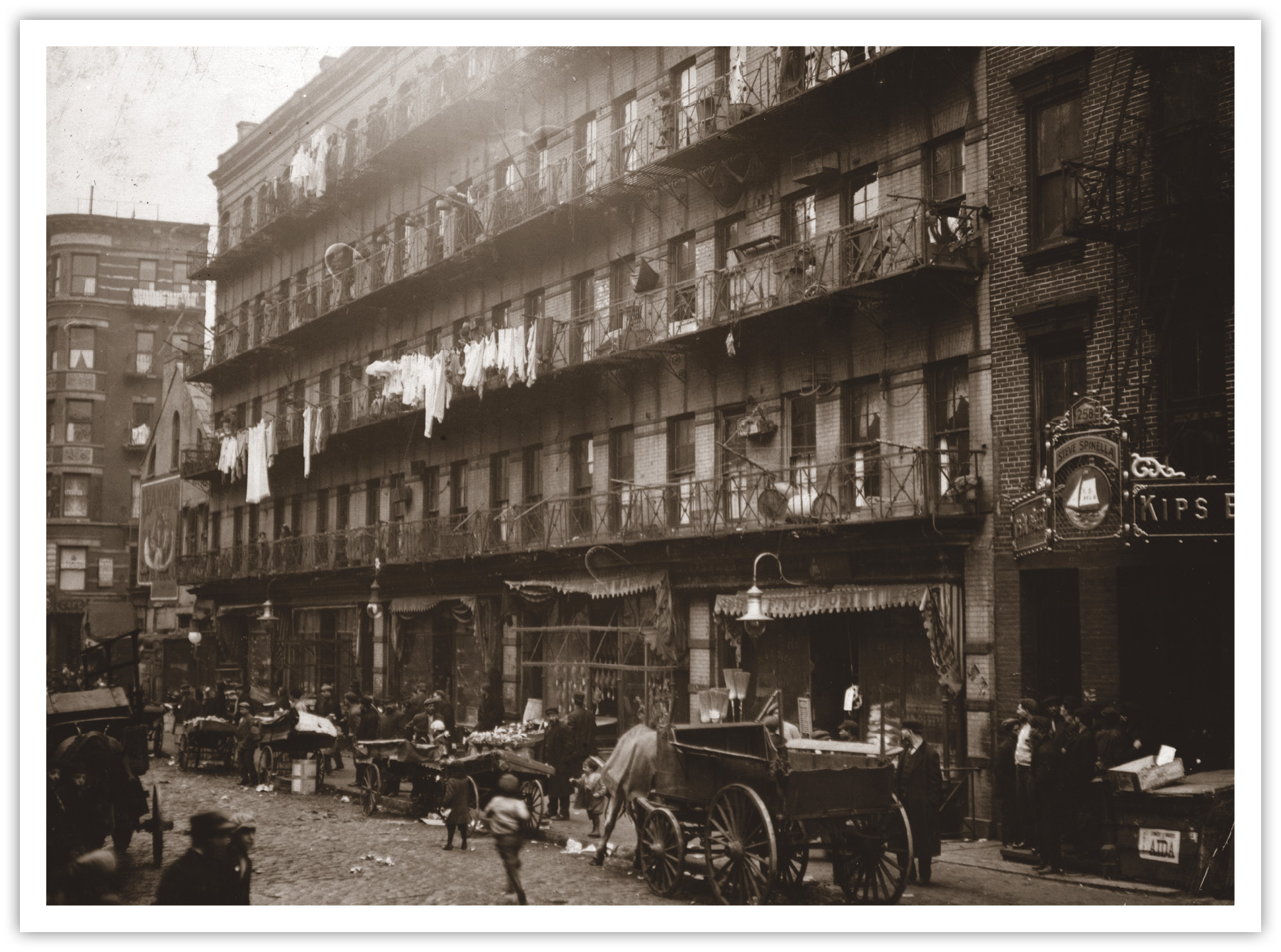 This row of tenement buildings on Elizabeth Street in New York City shows the - photo 11