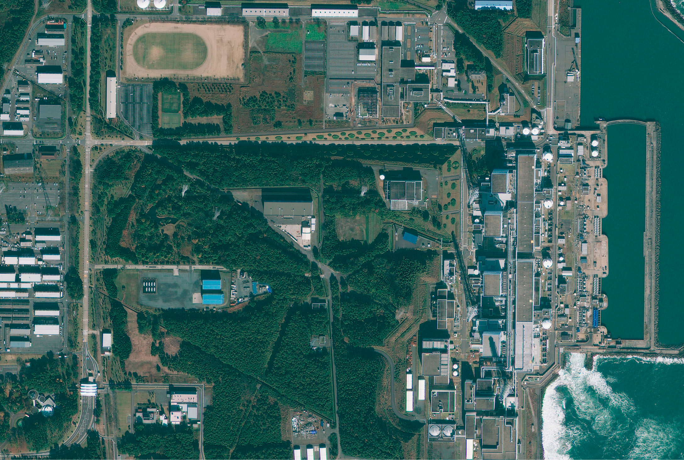 A satellite image of the Fukushima Daiichi nuclear plant was taken before - photo 3