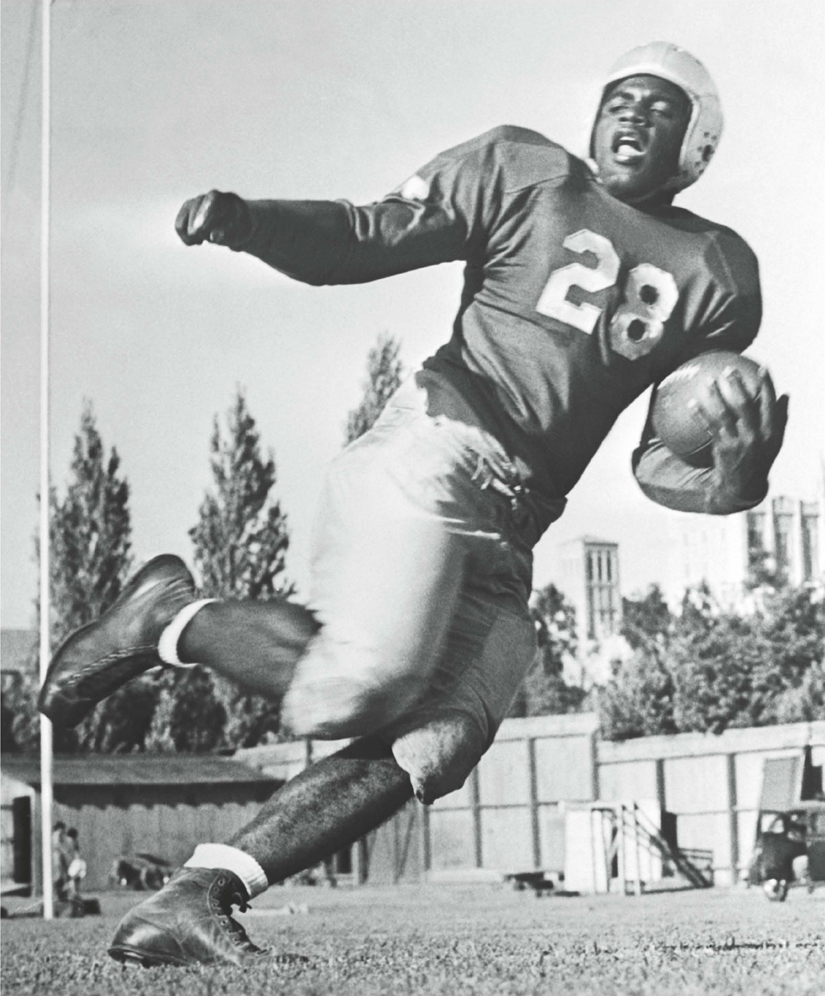 Jackie Robinson lettered in four sports including football during his college - photo 6