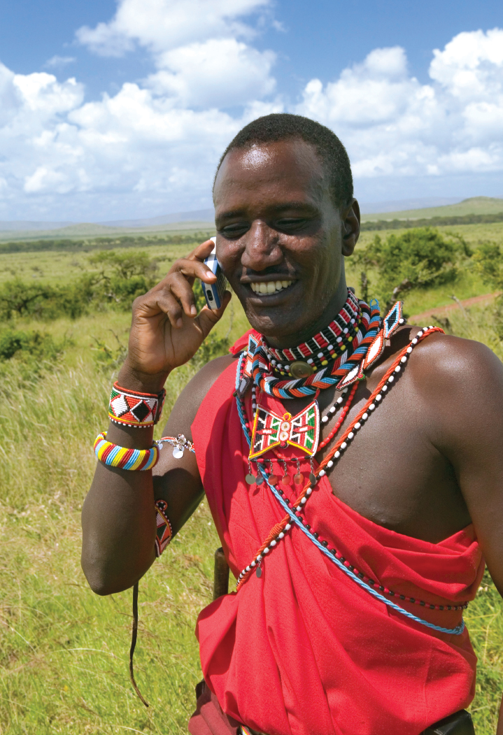 A Masai herdsman in East Africa blends old culture with new He is wearing - photo 6