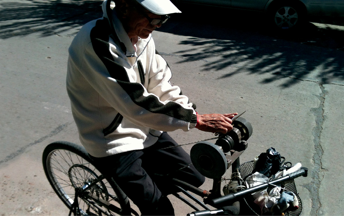 In Buenos Aires Argentina knife sharpeners sound a special whistle as they - photo 2