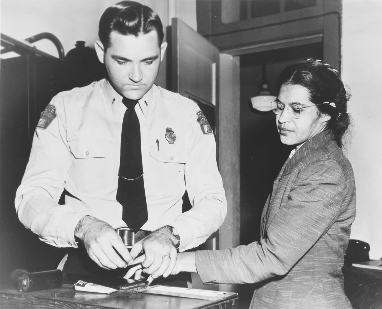 Rosa Parks was arrested and fingerprinted after refusing to give up her seat on - photo 4