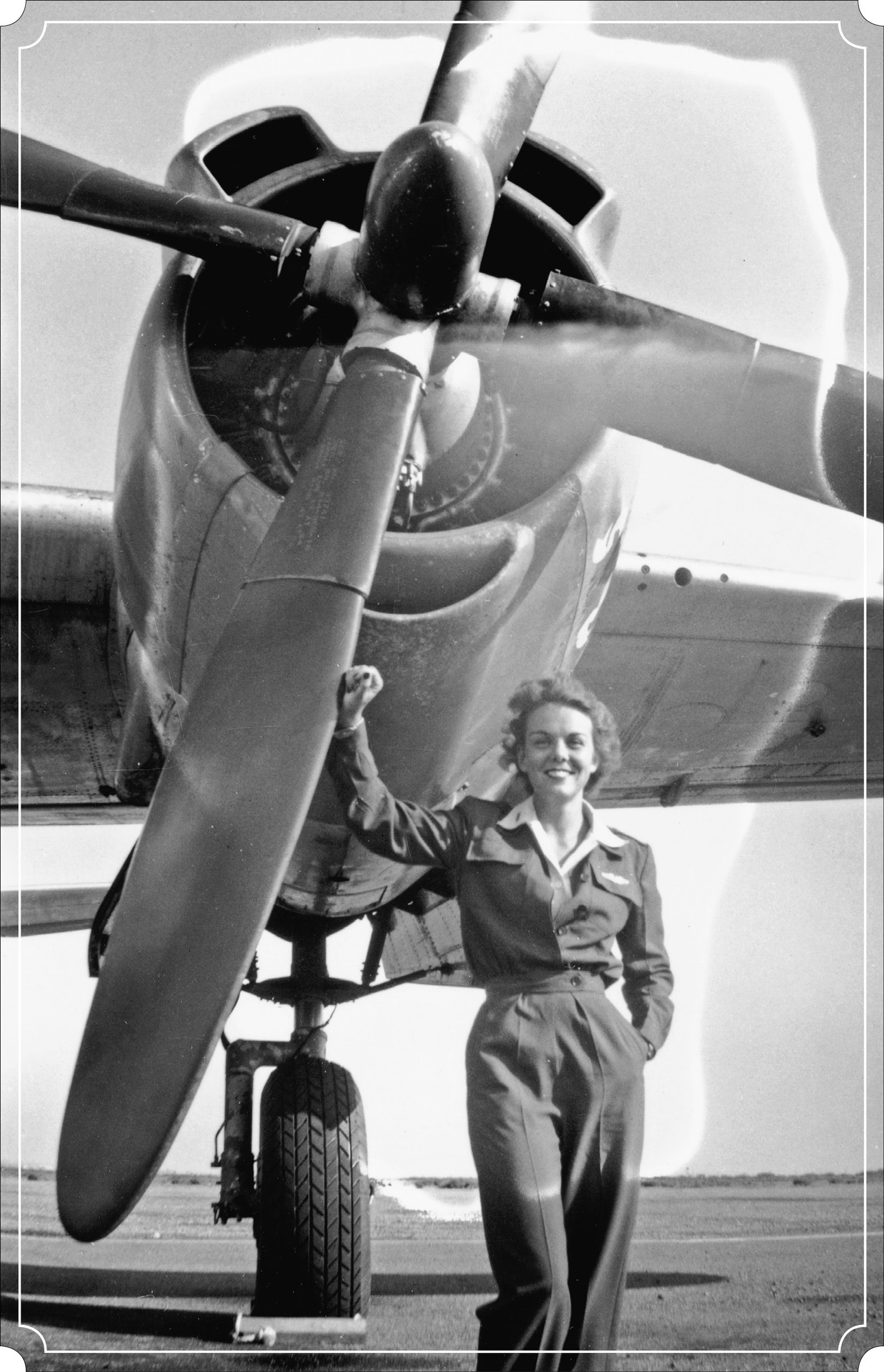 Nell Mickey Stevenson Bright class 43-W-7 poses in front of the B-26 she flew - photo 2