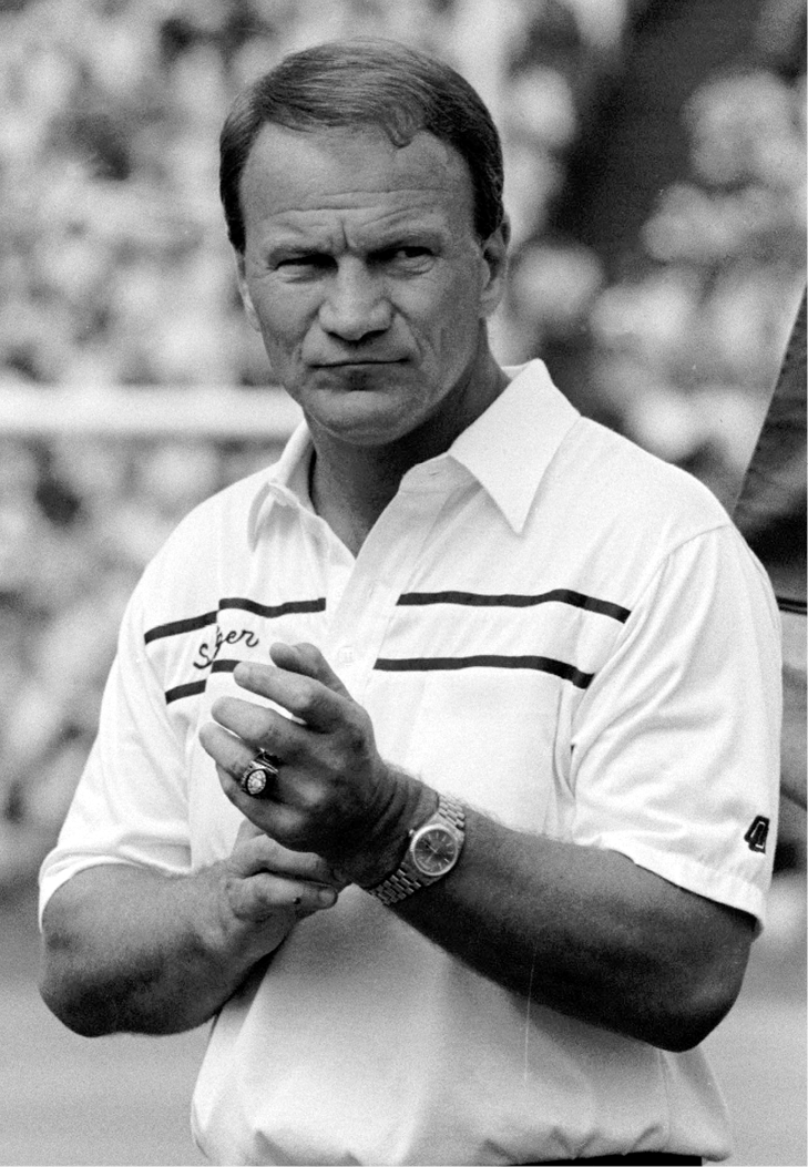 Head coach Barry Switzer ponders his next move during Oklahomas game against - photo 3