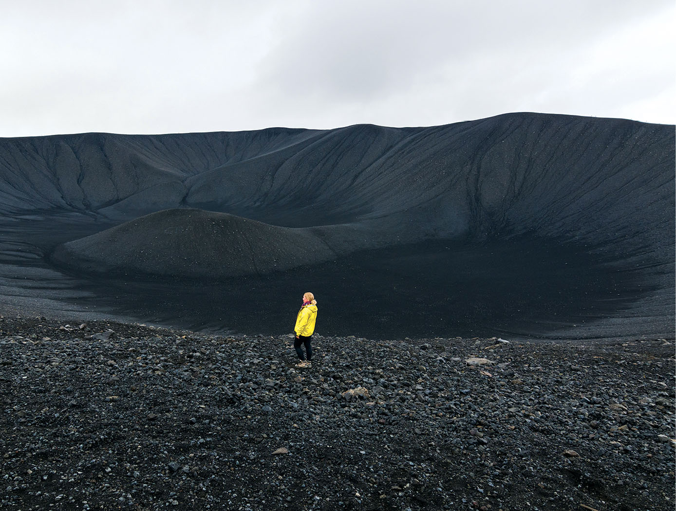 A woman pauses before the crater of Hverfell Volcano near Mvatn Lake See - photo 18