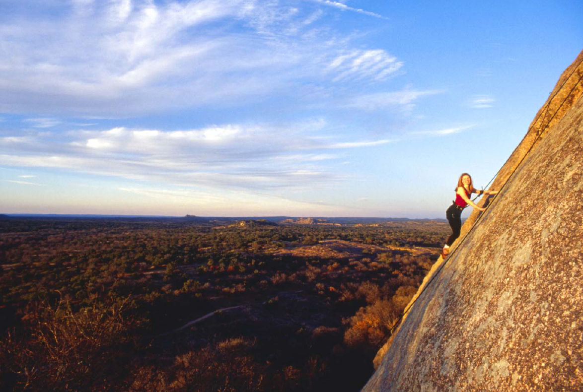 A climber on the Prok route Enchanted Rock State Natural Area Springs - photo 8