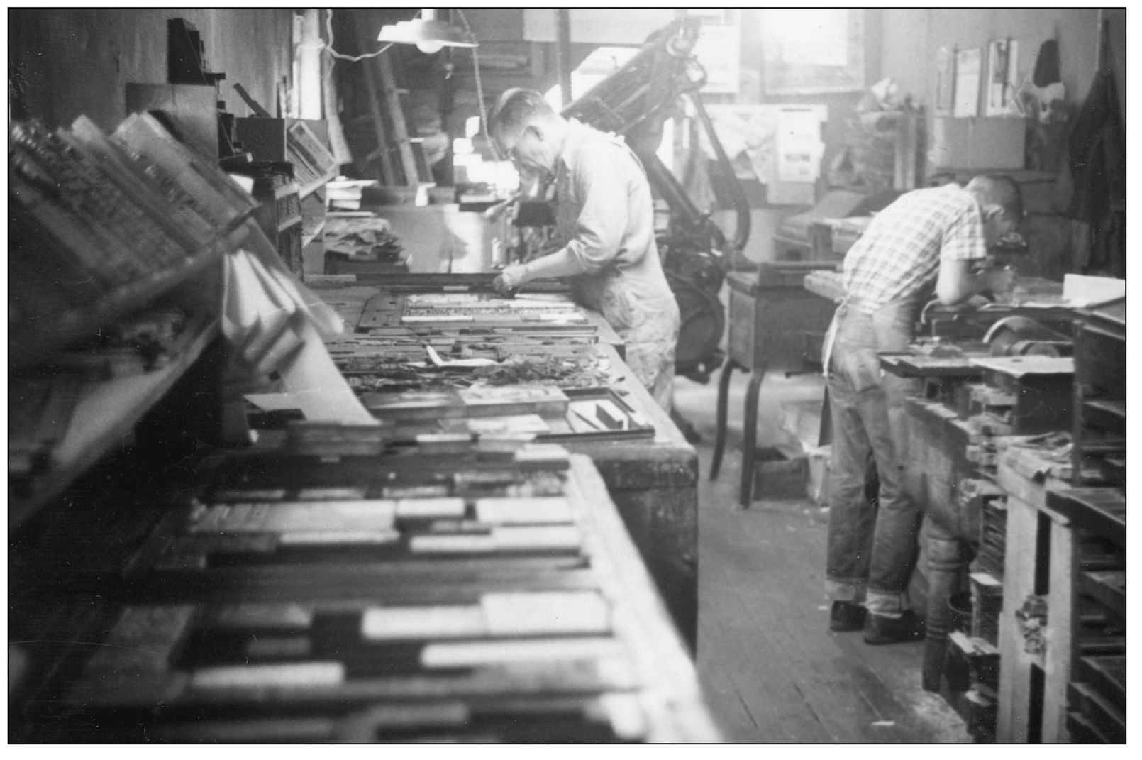 Hard at work at the Frederick Press Fred Wessel below at right - photo 4