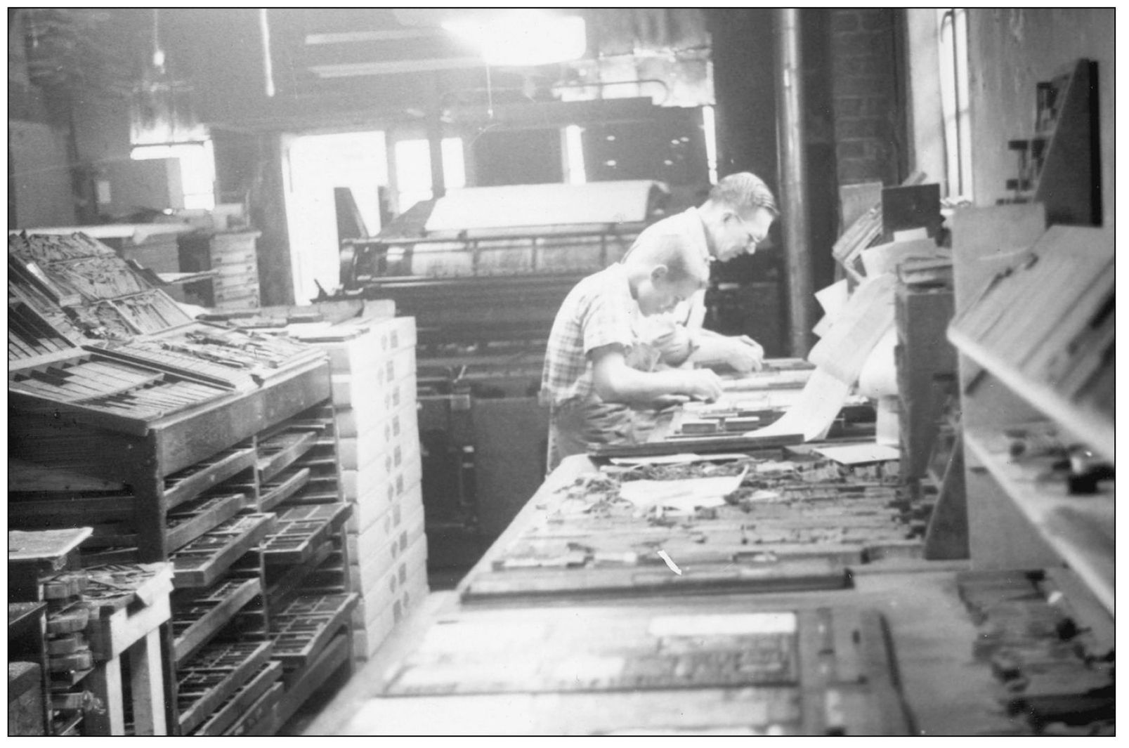 Hard at work at the Frederick Press Fred Wessel below at right - photo 5