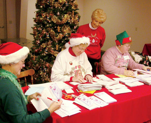 Each year Santas Elves respond to thousands of letters from children all over - photo 12