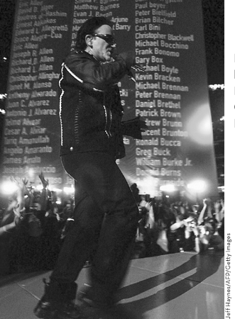 Bono performs during halftime of Super Bowl XXXVI in New Orleans Louisiana on - photo 2