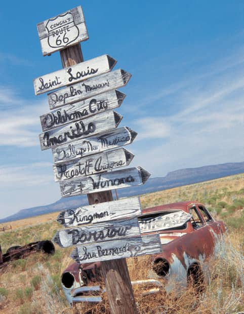 A directional marker in Truxton Arizona shows the way to a number of Route 66 - photo 3