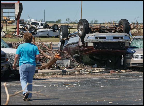 Torandoes near Oklahoma City were responsible for overturning cars and causing - photo 5