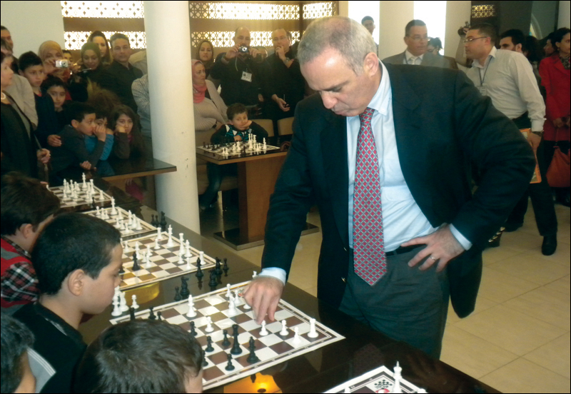 Garry Kasparov playing chess with young Tunisian players credit Khaled - photo 15