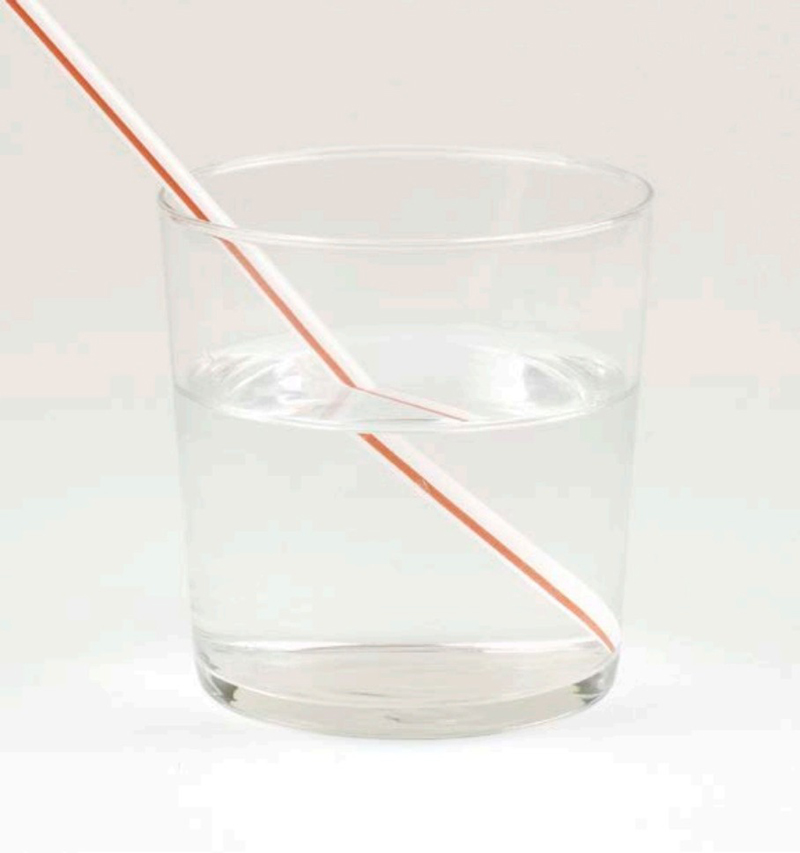 The straw appears to shift as it goes underwater because the water is - photo 6